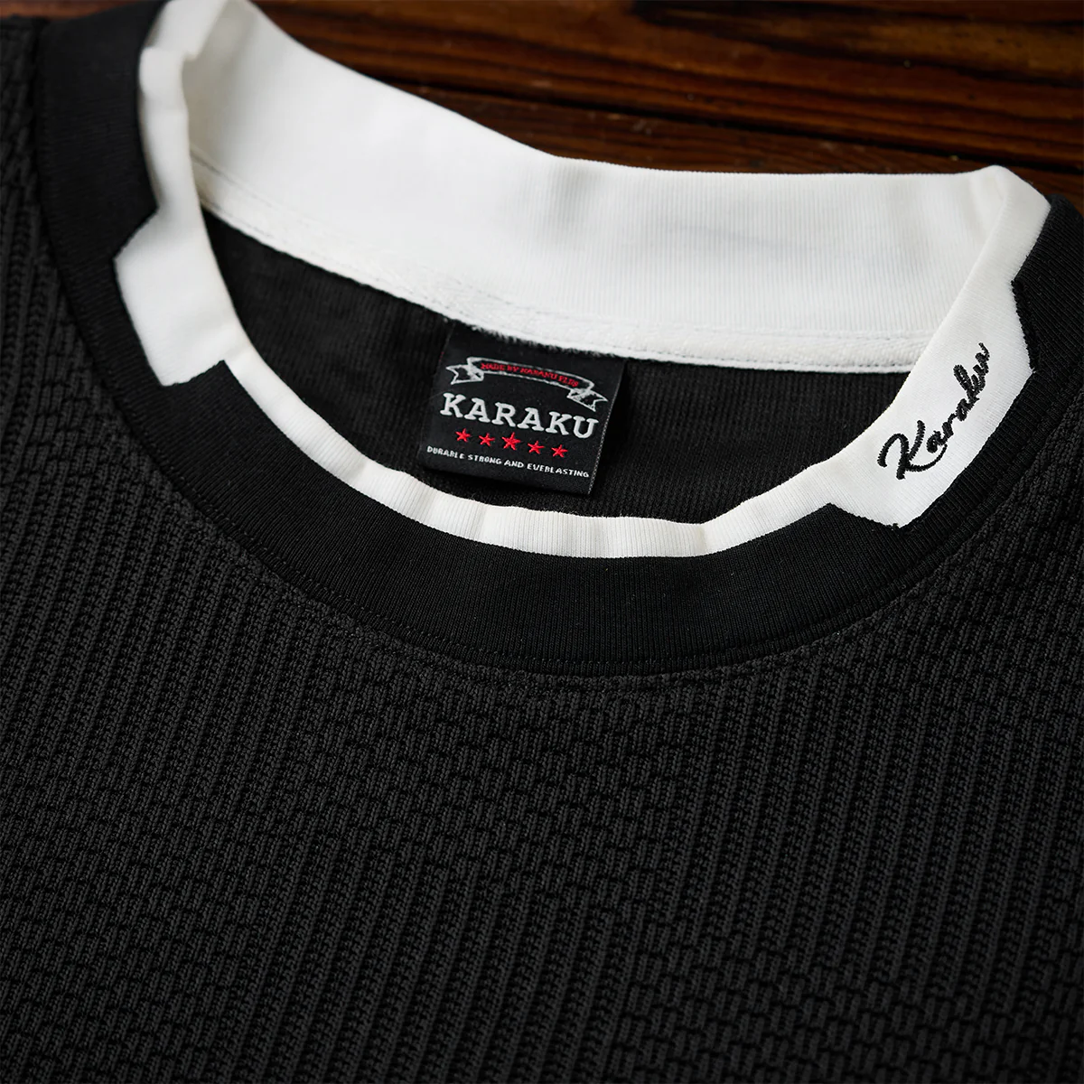 「KaraKu」ロゴ刺繍 フェイクレイヤードダイヤ柄ジャガードニットTee - Image 10